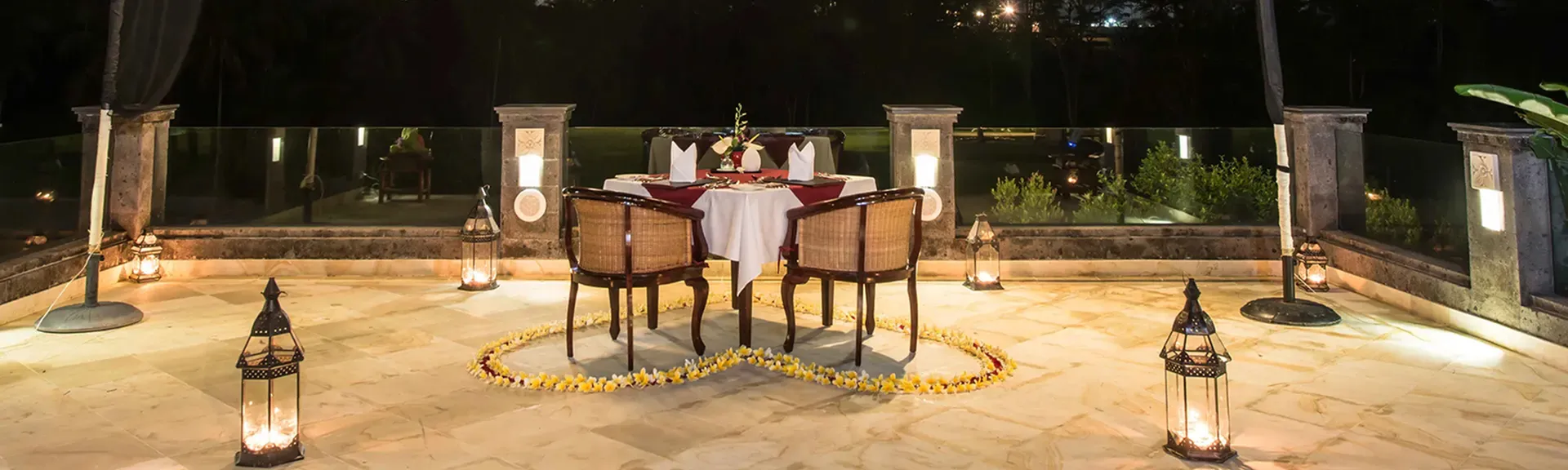 Romantic candlelight dinner setup at CasCades Restaurant.