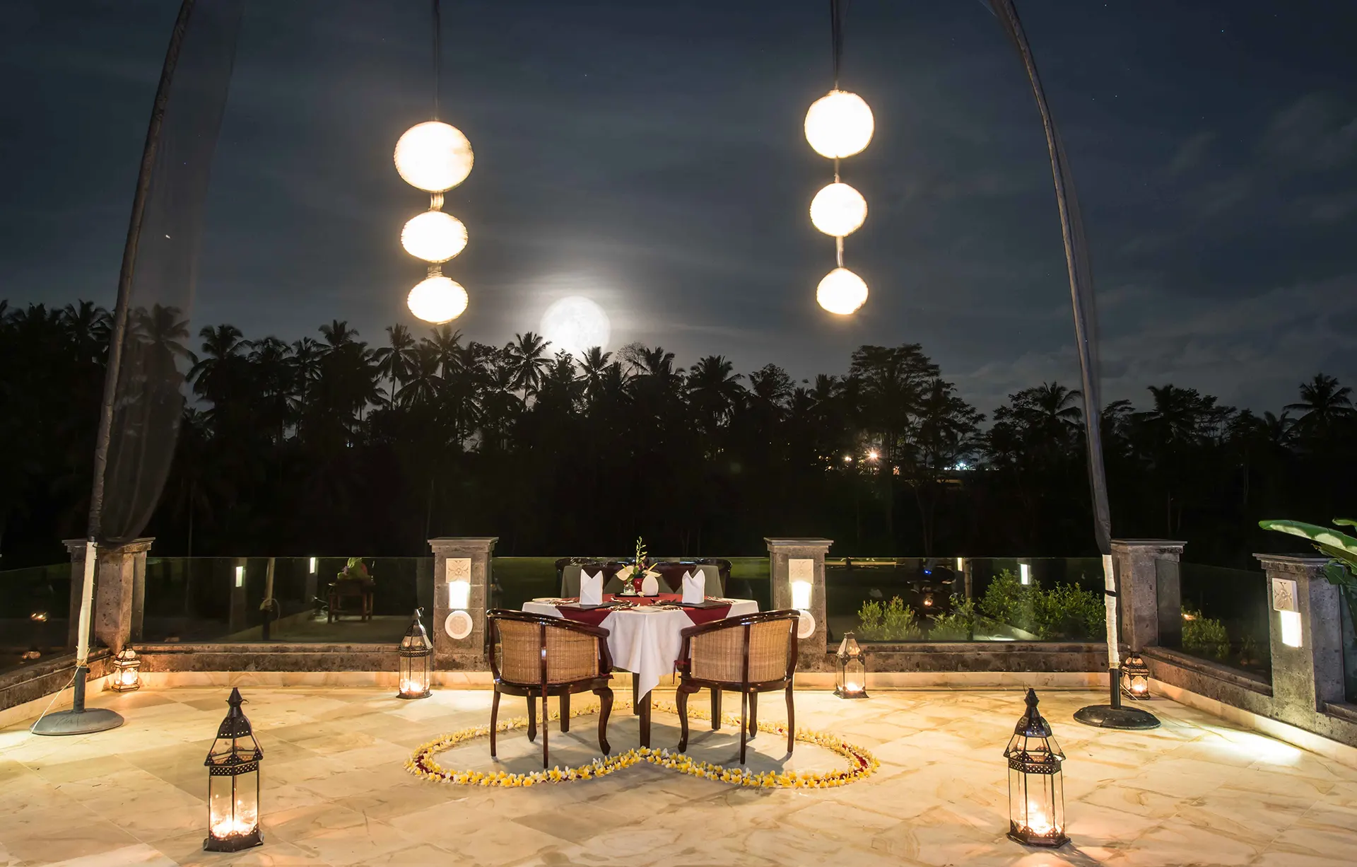 Romantic candlelight dinner setup at CasCades Restaurant.