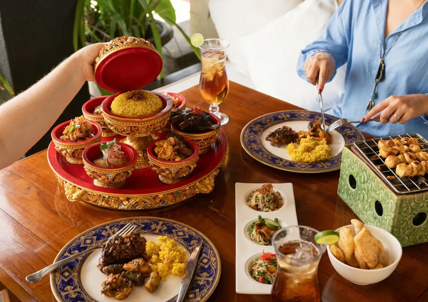 Traditional Balinese Rijsttafel dining experience with Sate Be Pasih at CasCades Restaurant Ubud Bali