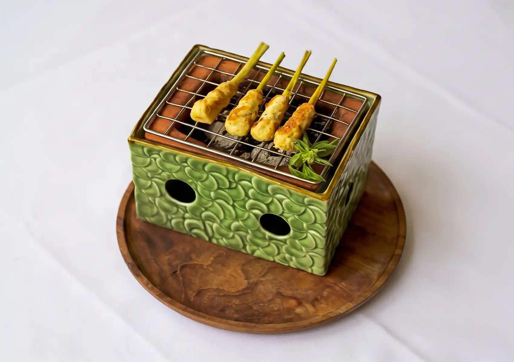 Traditional Sate Be Pasih Bali grilled seafood satay served at CasCades Restaurant Ubud